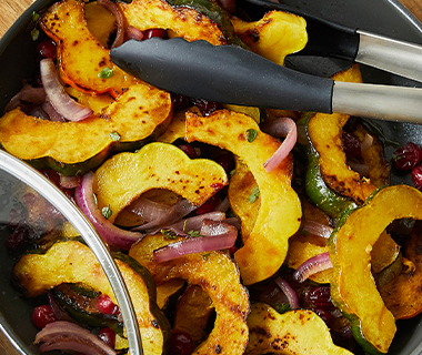 Roasted Acorn Squash with Cranberries and Red Onions