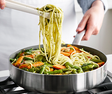 Pasta primavera with lemon pesto in a skillet