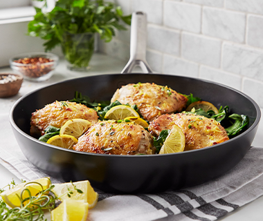 Pan-Seared Lemon Chicken Thighs with Sautéed Spinach