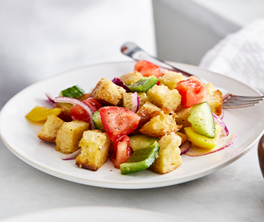 Plate of fresh panzanella salad with toasted croutons