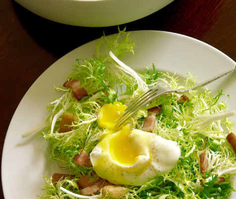 Bobby Flay's Frisée Salad with Croutons, Roquefort, Soft Boiled Eggs and Bacon Mustard Vinaigrette