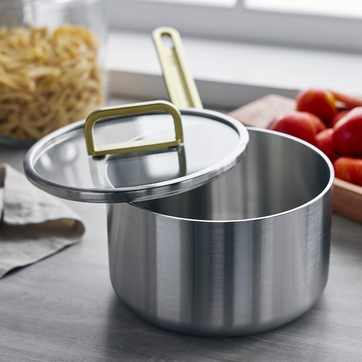 Saucepan made of triple layer stainless steel