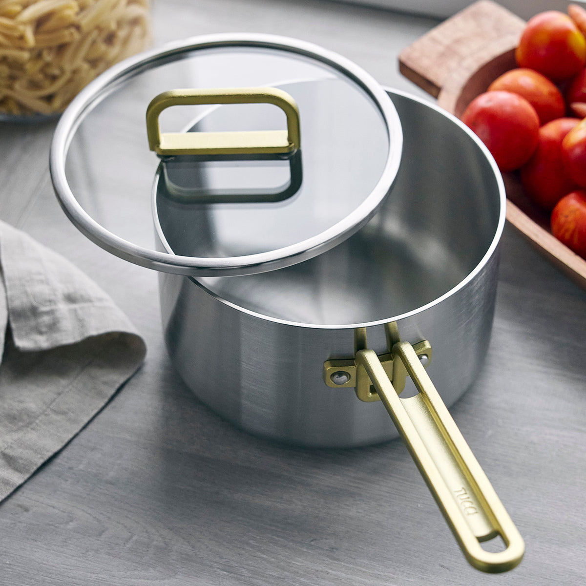 Saucepan with champagne colored handles