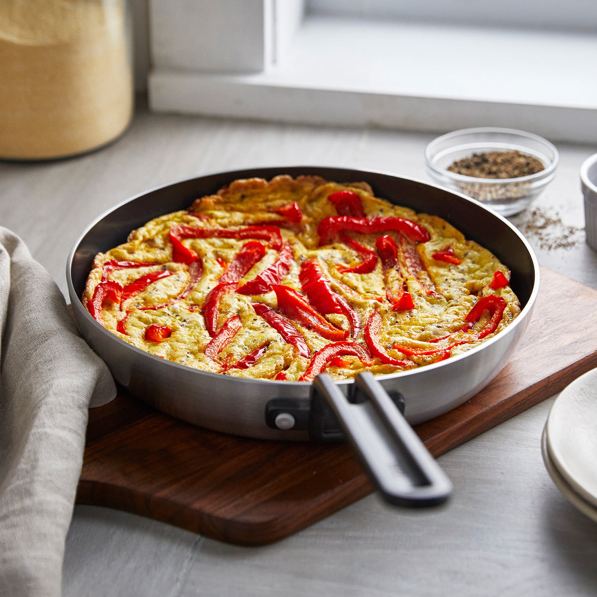 Stanley Tucci™ Stainless Steel Ceramic Nonstick 4-Piece Frypan Set with The Tucci Cookbook | Black Handles