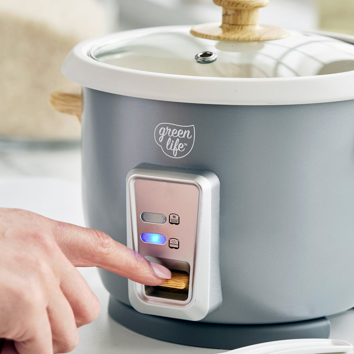 Rice cooker with one-switch design