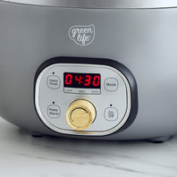 Slow cooker with delay start timer