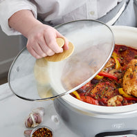 Slow cooker with stay cool handles