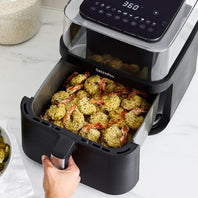 Air fryer with integrated shake reminder