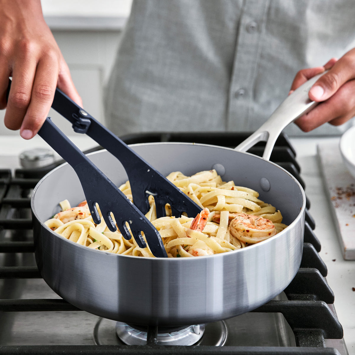 Silicone pasta tongs with a sturdy steel core