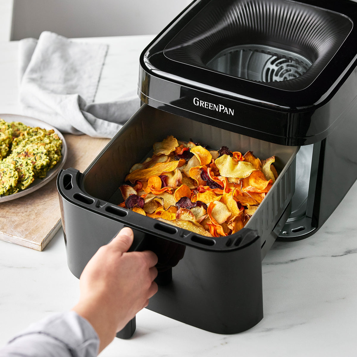 Air fryer with integrated shake reminder