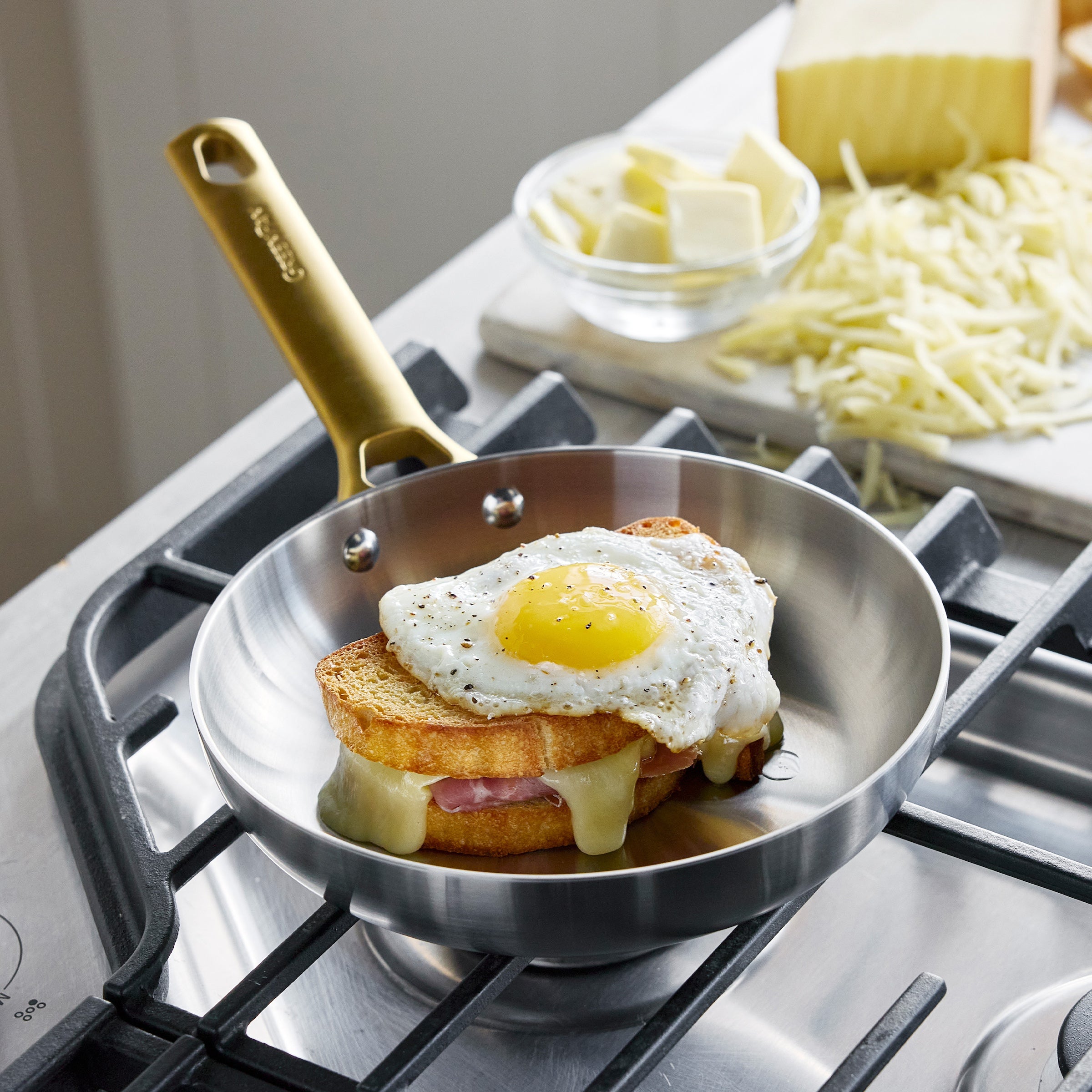 Making breakfast in a stainless steel frypan