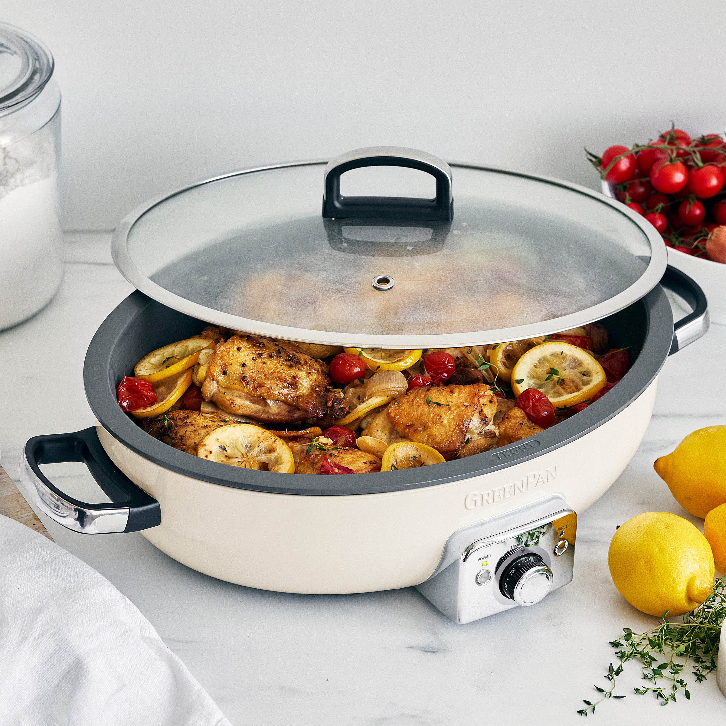 Oval electric skillet with tempered glass lid