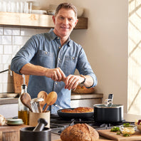 Bobby Flay cooking with aluminum cookware