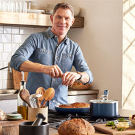 Bobby Flay cooking with aluminum cookware